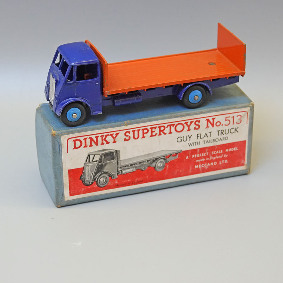Dinky 513 Guy flat truck with tailboard violet blue and orange