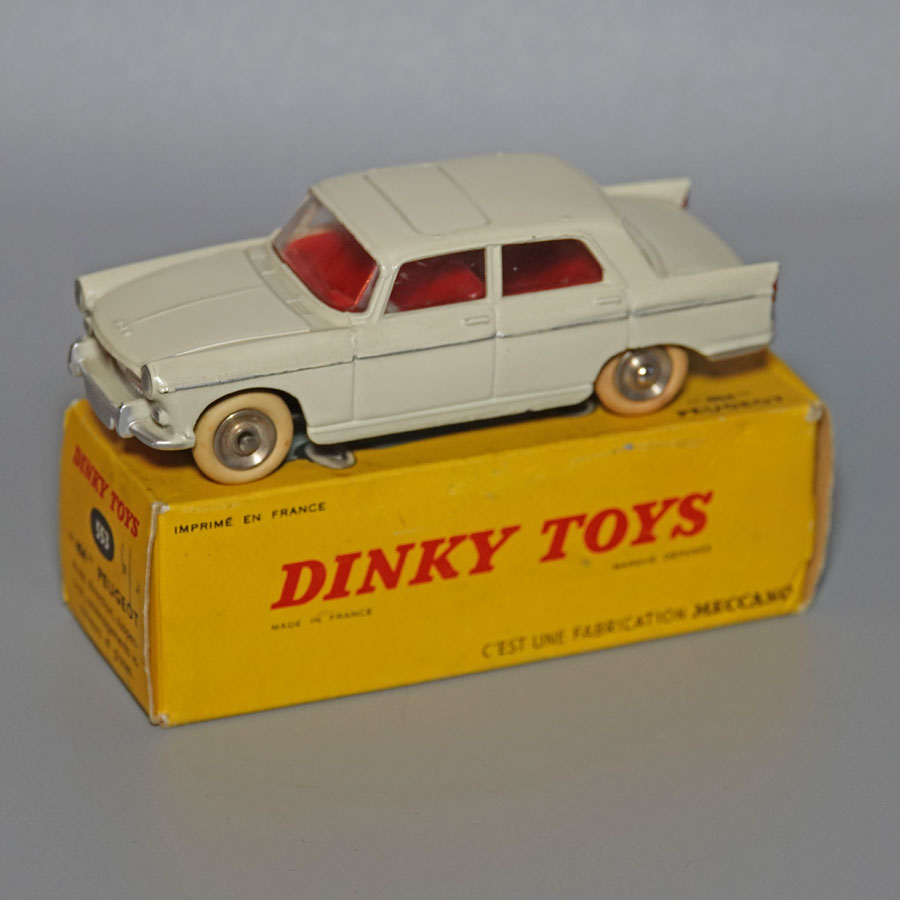 Dinky 553 Peugeot 404 cream red interior white tyres